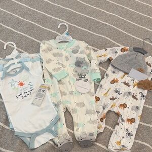 NWT Baby onesies and footed pajama sets